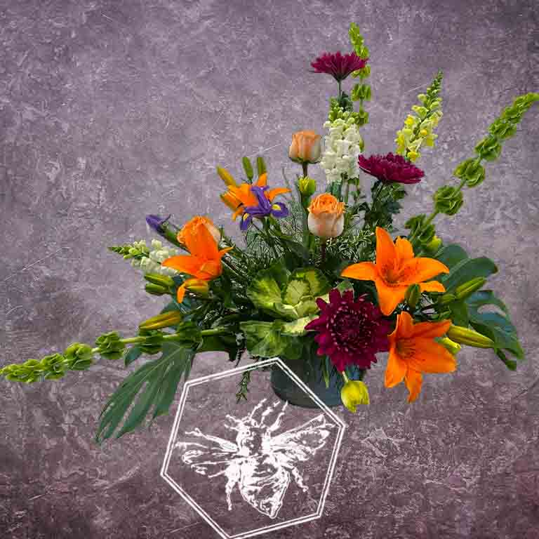 Premium modern arranged designers choice lilies with a creative sophistication and luxurious natural beauty