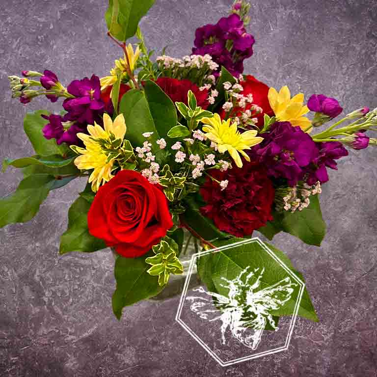 Hand tied fresh cut assortment of beautiful flowers featuring everyone's favorites