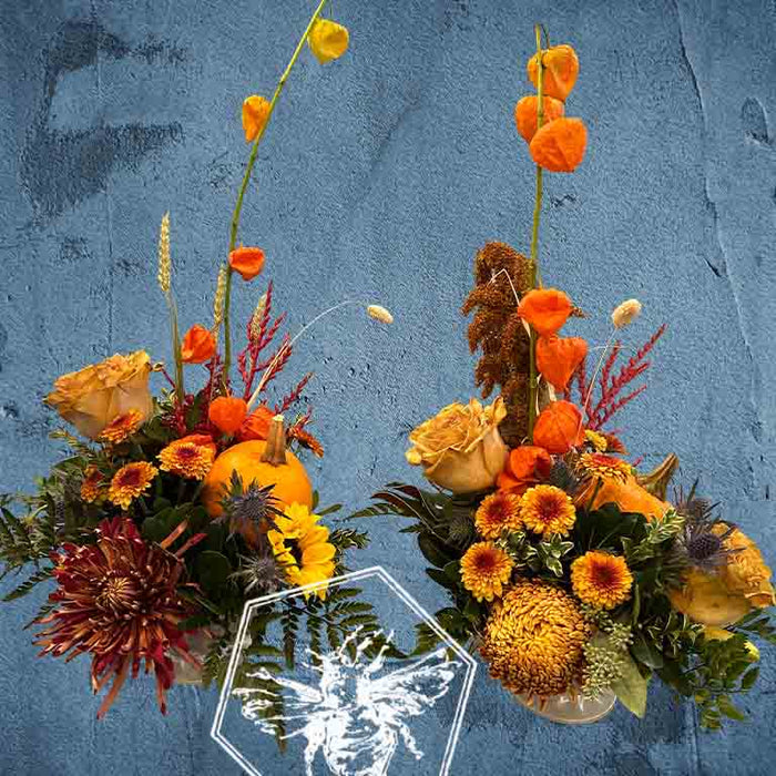 Fall seasonal event floral accents featuring mini pumpkins by The B Nest Studios