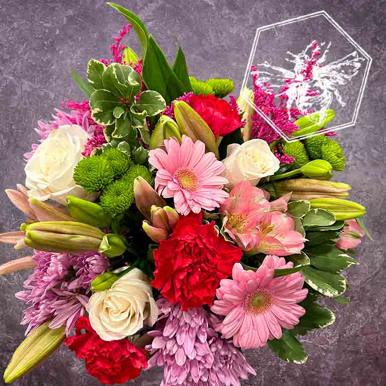 Hand tied fresh cut assortment of beautiful flowers featuring everyone's favorites