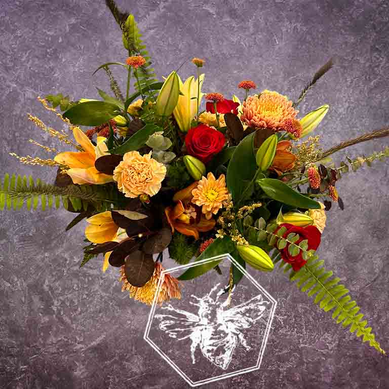Hand tied fresh cut assortment of beautiful flowers featuring everyone's favorites