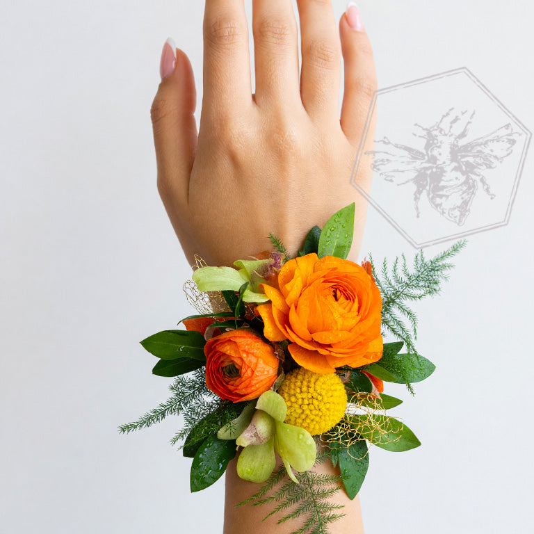 Wrist corsage featuring bright florals 