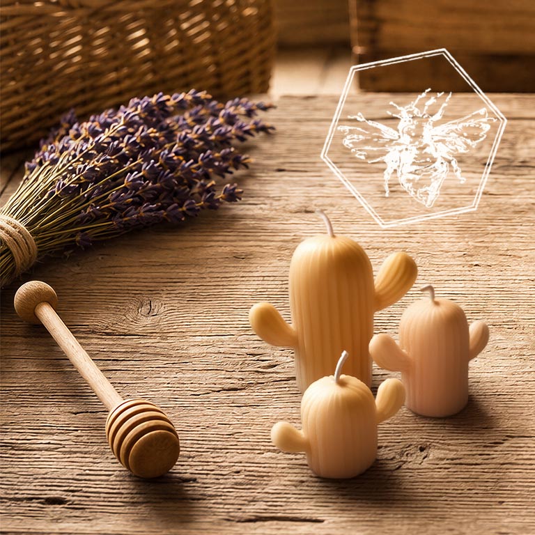 Beeswax candle hand-poured in the shape of small saguaro cacti