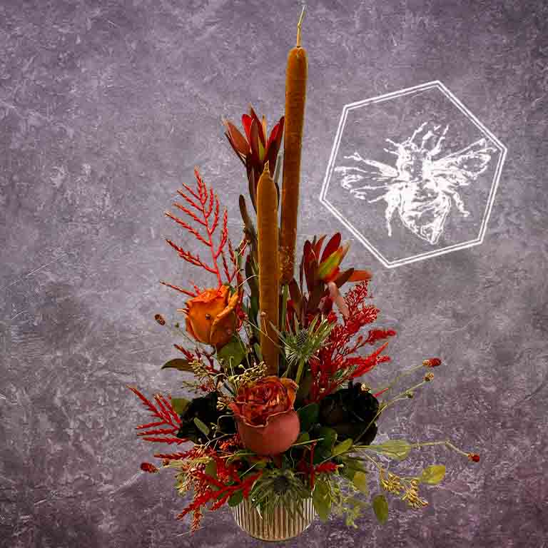 Modern seasonal flower arrangement with elevated feel and luxurious artisanal tone creatively and carefully crafted from the finest flowers and textures representing the season of the year 