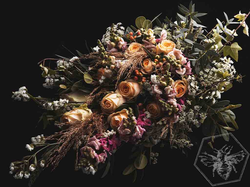 Memorial standing spray that is hand-crafted with absolute care and dignity by our design team, using premium, high-quality blooms to create a stunning, reverent focal piece that honors a unique life and legacy.
