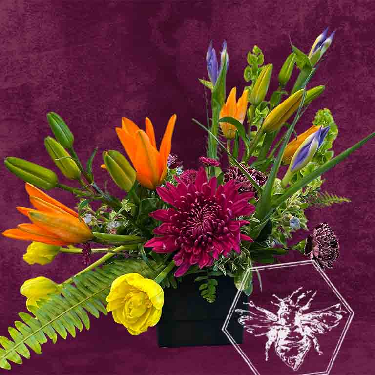 Premium modern arranged designers choice lilies with a creative sophistication and luxurious natural beauty