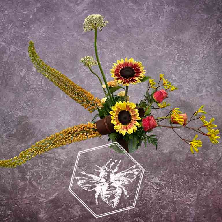 Luxurious modern arranged sunflowers featuring roses and kangaroo paw