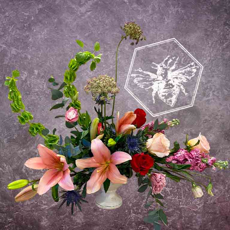 Premium modern arranged designers choice lilies with a creative sophistication and luxurious natural beauty horizontal extravaganza