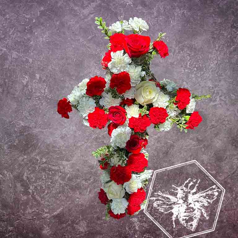 Memorial standing spray that is hand-crafted with absolute care and dignity by our design team, using premium, high-quality blooms to create a stunning, reverent focal piece that honors a unique life and legacy.