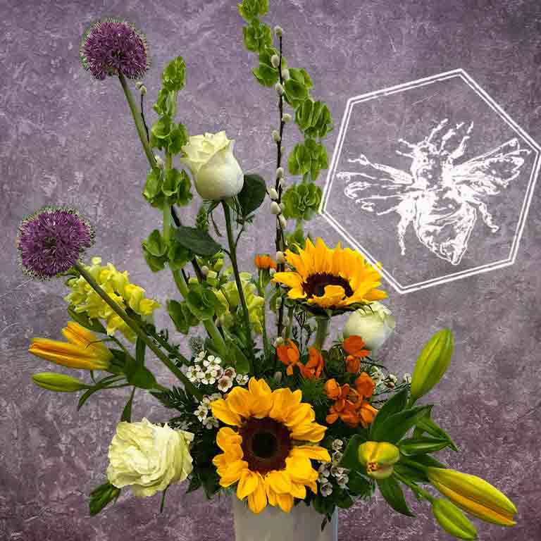 Luxurious modern arranged sunflowers featuring pussy willows, allium, white roses, stock and tiger lilies