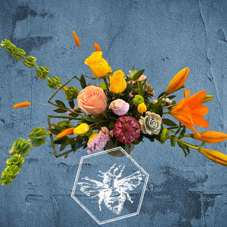 Colorful bouquet of flowers on a textured blue background with a white bee illustration.