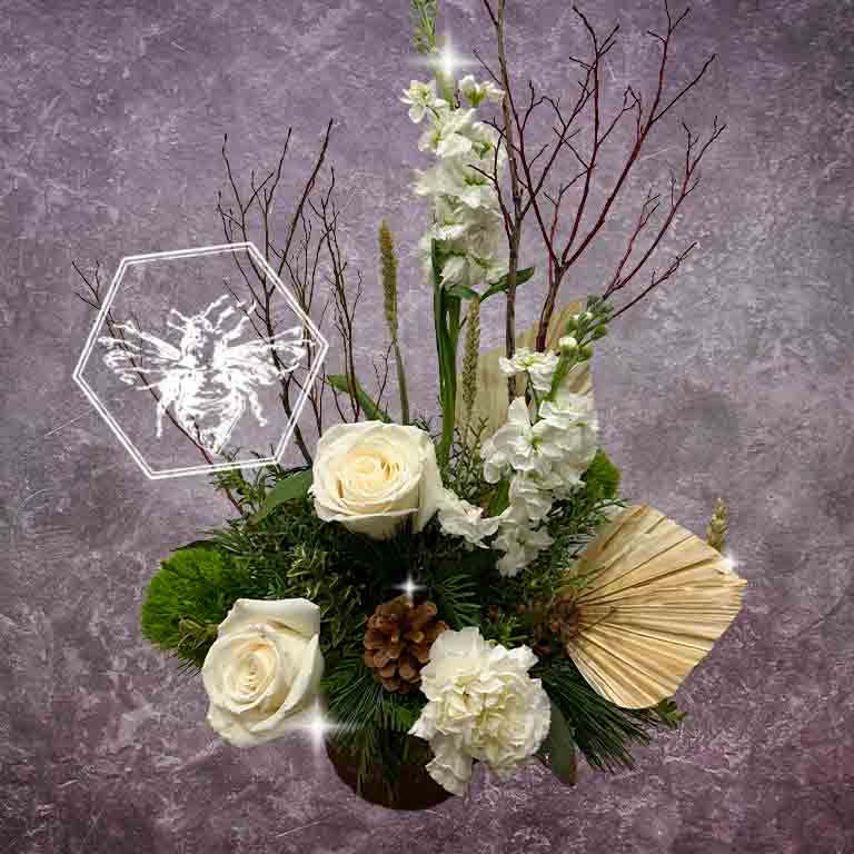 Modern seasonal flower arrangement with elevated feel and luxurious artisanal tone creatively and carefully crafted from the finest flowers and textures representing the season of the year 